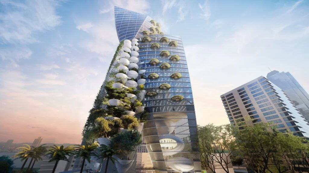 A sustainable building in the Philippines adorned with vibrant plants, showcasing eco-friendly design and urban greenery.