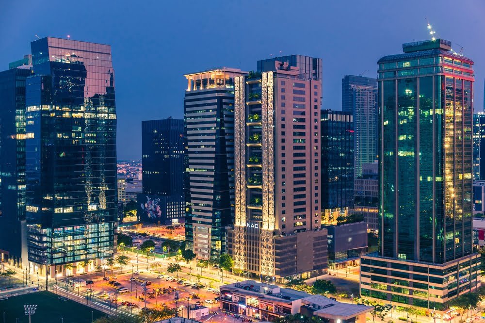 The modern BGC skyline at night in Taguig, Metro Manila, symbolising Real Estate Development Philippines.