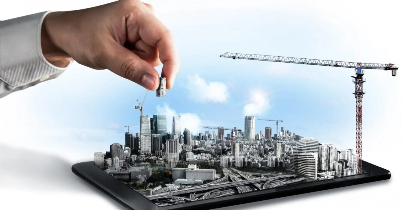 Philippines Infrastructure Development Analysis: A hand placing a miniature building into a 3D cityscape emerging from a tablet, symbolizing urban development and technology.