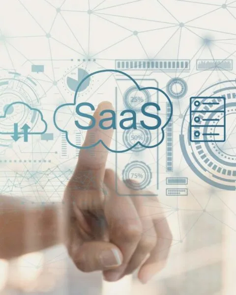 Philippines SaaS Market Growth: A person touches a transparent screen displaying SaaS and various cloud computing icons, symbolizing digital technology and data management.